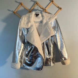 Fantastic fur lined silver chrome bomber jacket with buckle and fur detail!